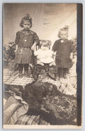 RPPC Three Infant Sisters Rocking Chair Real Photo Postcard Azo 4 Triangles Up