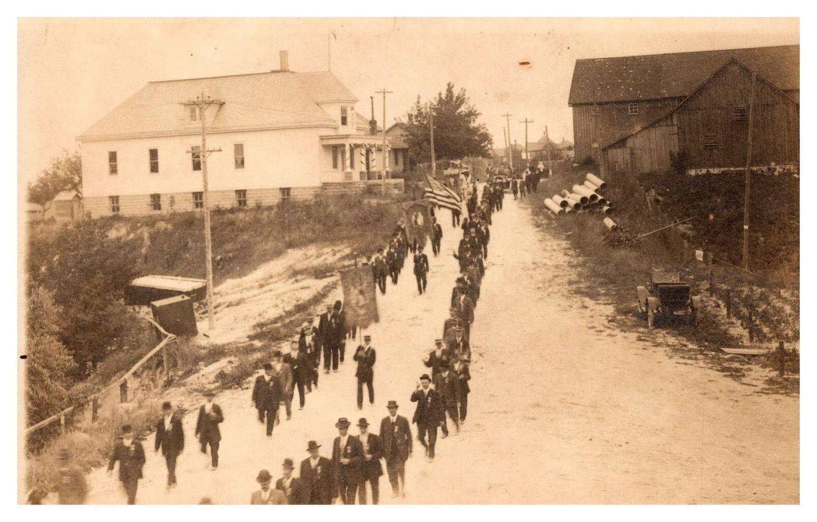 RPPC Town Parade Postcard with Main Street Crowd NOKO Stamp box Divided Back UNP